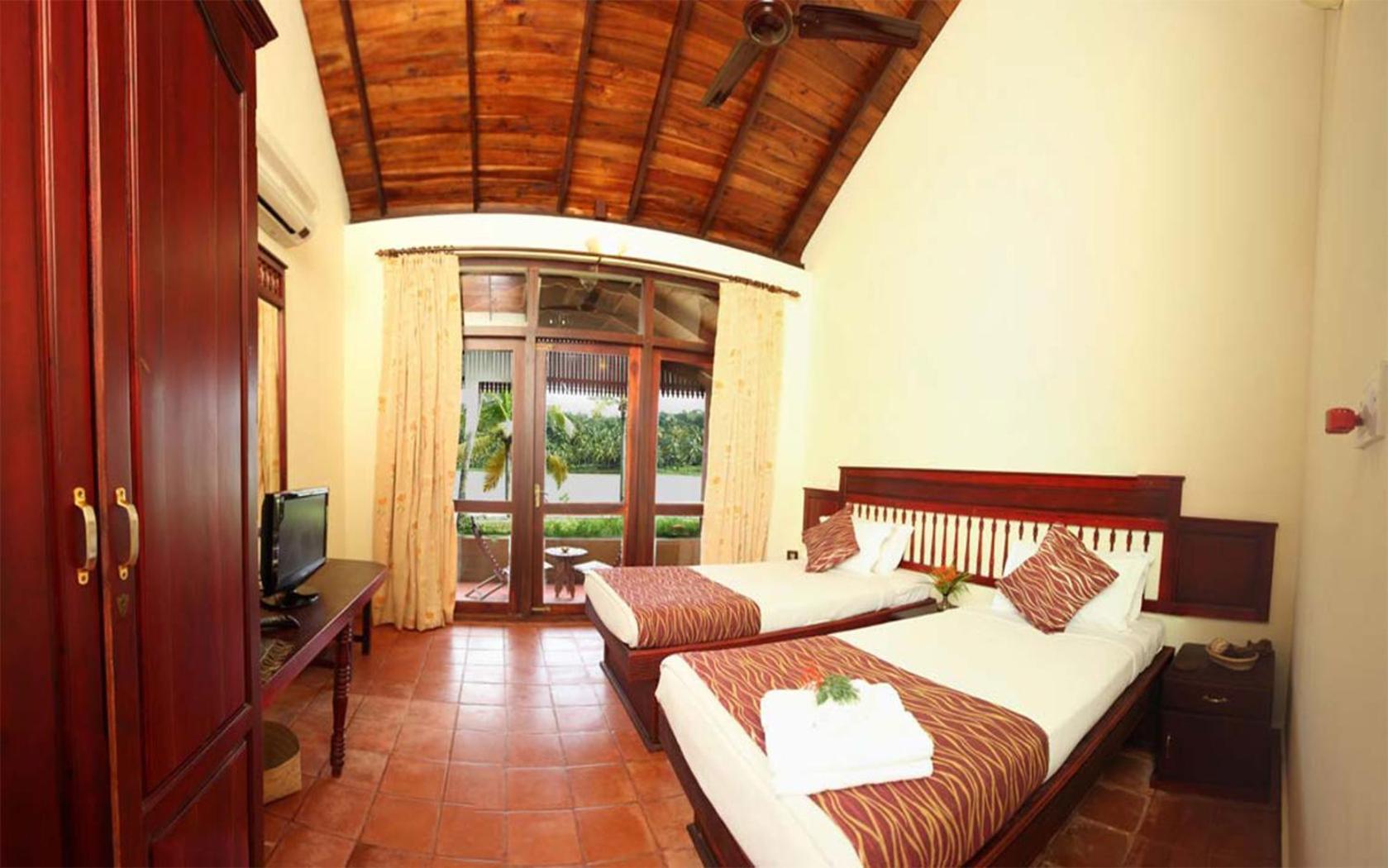 Fragrant Nature Backwater Resort & Ayurveda Spa Kollam Ruang foto